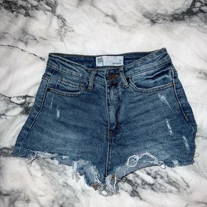 Distressed cut off Jean shorts from Tilly’s. Size 23 is equivalent to 0.